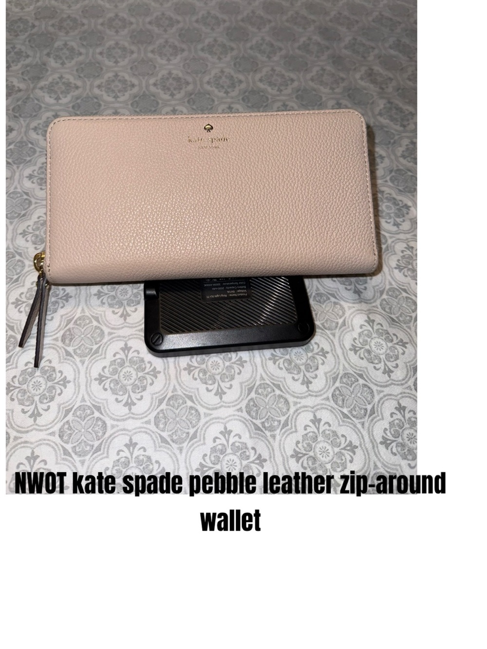 kate spade pebble leather zip-around wallet